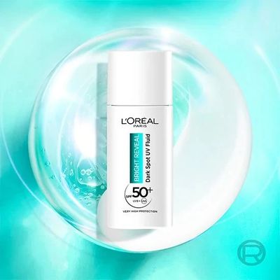 L'Oréal Paris Bright Reveal Denní Rozjasňující tónovací Anti-UV Fluid s SPF 50+ proti tmavým skvrnám, 50 ml
